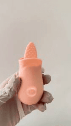 Pleasant Tongue Vibrating Massager in hand showcasing its soft, flexible tip for pleasurable sensations.