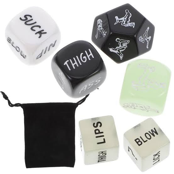 Set of dice for couples to deepen intimacy on a black pouch on a white background.